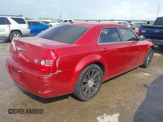2010 Chrysler 300 with VIN 2C3CA2CV3AH279913, listed as a IAAI auction lot 40731536 with 143,969 mi miles. Bid and sale history available at carsss.com. Image 4.