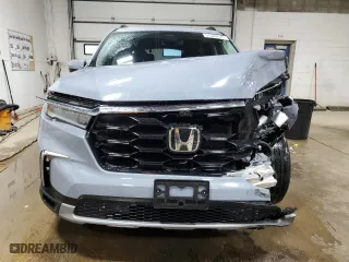 2023 Honda Pilot Elite with VIN 5FNYG1H89PB043021, listed as a Copart auction lot 51522675 with 27,465 mi miles and Salvage Title. Bid and sale history available at carsss.com. Image 5.