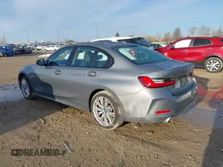 2023 BMW 3 Series 330e xDrive with VIN 3MW39FS01P8C81368, listed as a IAAI auction lot 41859161 with 72,648 mi miles. Bid and sale history available at carsss.com. Image 3.