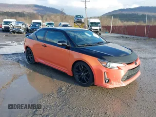 2015 Scion tC with VIN JTKJF5C77FJ008276, listed as a IAAI auction lot 41679236 with 90,987 mi miles. Bid and sale history available at carsss.com. Image 1.