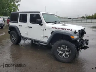 2019 Jeep Wrangler Unlimited Rubicon with VIN 1C4HJXFG8KW678265, listed as a Copart auction lot 57700695 with 120,950 mi miles and Salvage title. Bid and sale history available at DreamBid. Image 4.