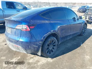 2024 Tesla Model Y Long Range with VIN 7SAYGDEE5RA252075, listed as a IAAI auction lot 41380481 with 13,088 mi miles. Bid and sale history available at carsss.com. Image 4.