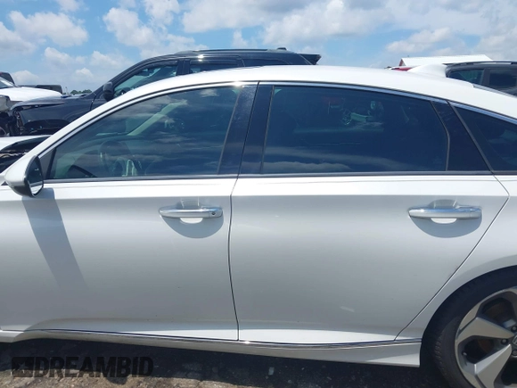 2019 Honda Accord Touring with VIN 1HGCV2F96KA015987, listed as a IAAI auction lot 42528744 with 174,735 mi miles and . Bid and sale history available at DreamBid. Image 15.