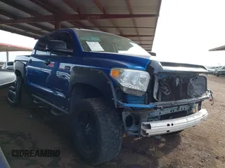 2016 Toyota Tundra 4WD Truck SR5 with VIN 5TFDW5F1XGX565242, listed as a IAAI auction lot 41724506 with 127,984 mi miles. Bid and sale history available at carsss.com. Image 1.