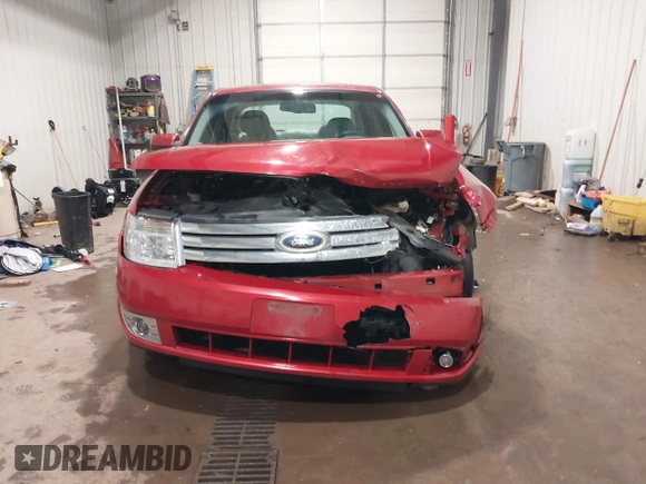 2009 Ford Taurus SEL with VIN 1FAHP24W89G123452, listed as a IAAI auction lot 41335622 with 229,182 mi miles. Bid and sale history available at carsss.com. Image 12.