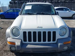 2004 Jeep Liberty Sport with VIN 1J4GL48K24W303510, listed as a IAAI auction lot 41660788 with 178,067 mi miles. Bid and sale history available at carsss.com. Image 12.