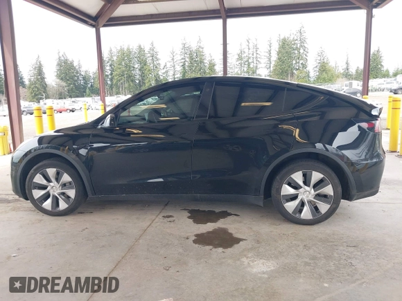 2023 Tesla Model Y Long Range with VIN 7SAYGDEE4PF789102, listed as a IAAI auction lot 41788860 with 88,457 mi miles and . Bid and sale history available at DreamBid. Image 14.