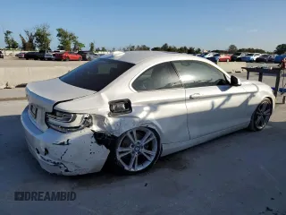 2015 BMW 2 Series 228i with VIN WBA1F5C59FV257321, listed as a Copart auction lot 80915464 with 113,776 mi miles and Salvage title. Bid and sale history available at DreamBid. Image 3.