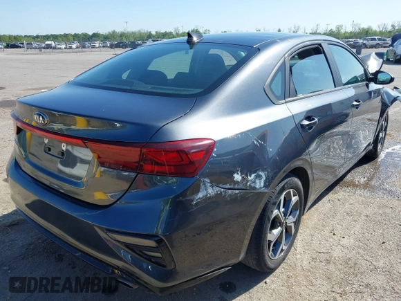 2021 Kia Forte LXS with VIN 3KPF24AD5ME309702, listed as a IAAI auction lot 41992202 with 69,531 mi miles and . Bid and sale history available at DreamBid. Image 4.