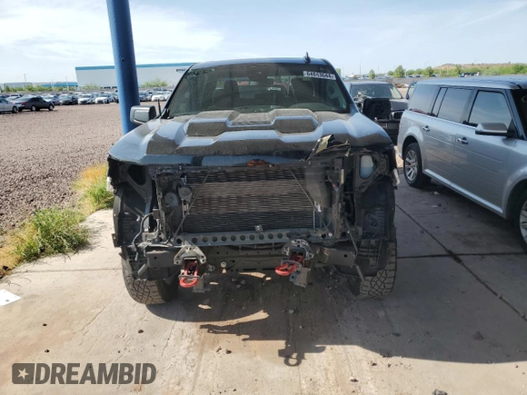 2022 Chevrolet Silverado 1500 Custom Trail Boss with VIN 3GCPDCED0NG631950, listed as a Copart auction lot 64843644 with 49,229 mi miles and Salvage Title. Bid and sale history available at DreamBid. Image 5.