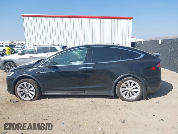 2019 Tesla Model X 75D with VIN 5YJXCBE22KF184504, listed as a IAAI auction lot 41802023 with 137,094 mi miles. Bid and sale history available at carsss.com. Image 14.