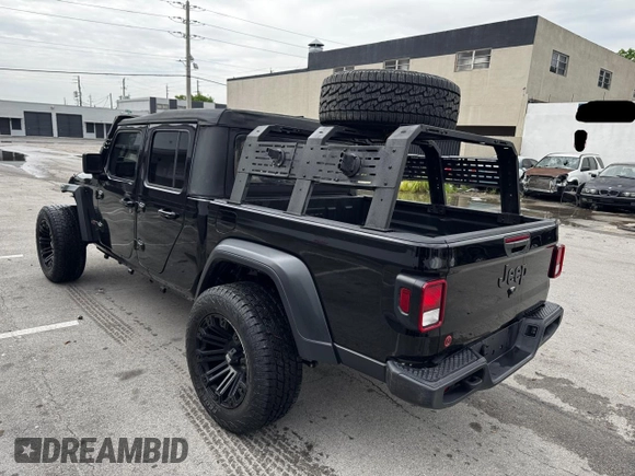 2024 Jeep Gladiator Sport S with VIN 1C6HJTAG2RL132886, listed as a Copart auction lot 63946735 with 6,111 mi miles and Clean title. Bid and sale history available at DreamBid. Image 3.