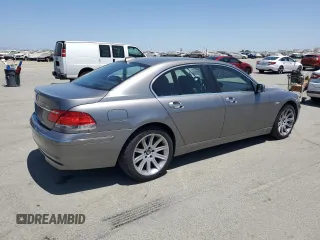 2006 BMW 7 Series 750i with VIN WBAHL83546DT02261, listed as a Copart auction lot 61686475 with 86,909 mi miles and Salvage title. Bid and sale history available at DreamBid. Image 3.
