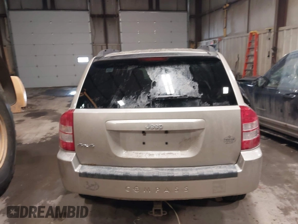 2010 Jeep Compass Sport with VIN 1J4NF4FB7AD501587, listed as a IAAI auction lot 41514419 with 154,826 mi miles. Bid and sale history available at carsss.com. Image 16.