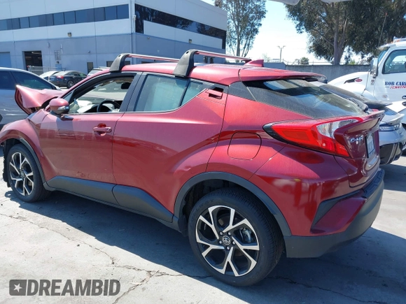 2019 Toyota C-HR XLE with VIN JTNKHMBX1K1060316, listed as a IAAI auction lot 41764464 with 42,956 mi miles. Bid and sale history available at carsss.com. Image 3.