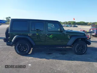2021 Jeep Wrangler Unlimited 80th Anniversary with VIN 1C4HJXDN6MW685090, listed as a IAAI auction lot 41816088 with 31,546 mi miles and . Bid and sale history available at DreamBid. Image 14.