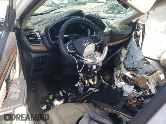 2020 Honda CR-V EX-L z VIN 7FARW1H85LE010622, wystawiony jako Copart lot #51293365 z przebiegiem Nie podano mil oraz Szkoda całkowita • Salvage title. Historia ofert i sprzedaży dostępna na DreamBid. Obrazek 8.