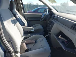 2004 Ford Freestar SE z VIN 2FMZA51614BB12374, wystawiony jako IAAI lot #40813075 z przebiegiem Nie podano mil oraz . Historia ofert i sprzedaży dostępna na DreamBid. Obrazek 5.