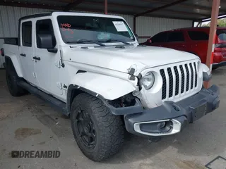2021 Jeep Gladiator Willys z VIN 1C6HJTAG0ML505674, wystawiony jako IAAI lot #42249317 z przebiegiem 60 150 mil mil oraz . Historia ofert i sprzedaży dostępna na DreamBid. Obrazek 1.