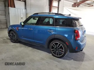 2019 MINI Countryman John Cooper Works with VIN WMZYV9C52K3F03128, listed as a Copart auction lot 79656094 with 58,394 mi miles and Salvage Title. Bid and sale history available at carsss.com. Image 2.