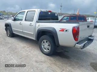 2009 GMC Canyon SLE1 z VIN 1GTDT13E398100890, wystawiony jako IAAI lot #42030572 z przebiegiem 160 181 mil mil oraz . Historia ofert i sprzedaży dostępna na DreamBid. Obrazek 3.