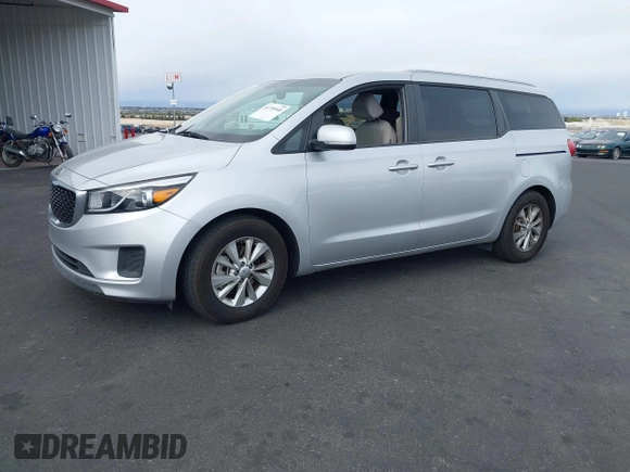 2016 Kia Sedona LX with VIN KNDMB5C10G6148931, listed as a IAAI auction lot 41799548 with 76,307 mi miles. Bid and sale history available at carsss.com. Image 2.