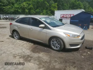 2018 Ford Focus SE with VIN 1FADP3F28JL292624, listed as a Copart auction lot 58960775 with 99,385 mi miles and Salvage title. Bid and sale history available at DreamBid. Image 4.