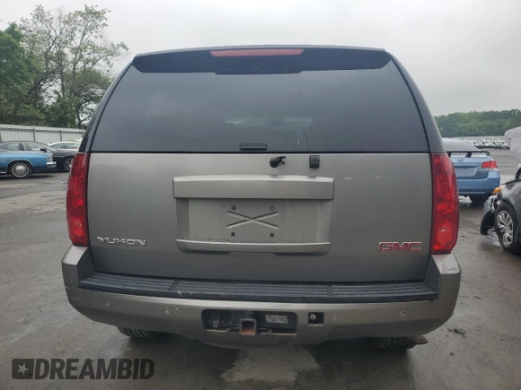 2007 GMC Yukon SLT with VIN 1GKFK13007J117446, listed as a Copart auction lot 55974665 with 204,785 mi miles and Salvage title. Bid and sale history available at DreamBid. Image 6.