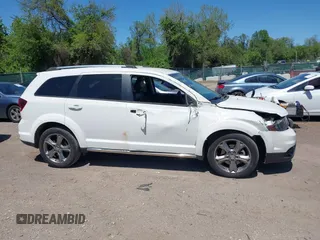 2016 Dodge Journey Crossroad Plus z VIN 3C4PDCGG4GT154134, wystawiony jako IAAI lot #42124659 z przebiegiem 101 700 mil mil oraz . Historia ofert i sprzedaży dostępna na DreamBid. Obrazek 13.