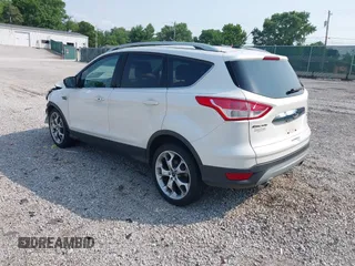 2015 Ford Escape Titanium with VIN 1FMCU0JXXFUA07175, listed as a IAAI auction lot 42447067 with 94,893 mi miles and . Bid and sale history available at DreamBid. Image 3.