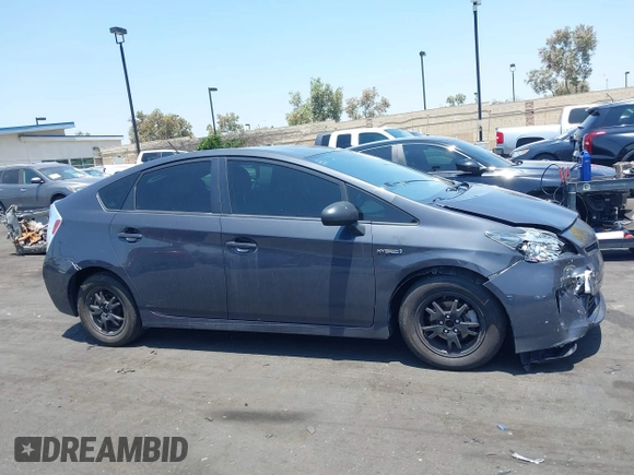 2015 Toyota Prius Four with VIN JTDKN3DUXF0401038, listed as a IAAI auction lot 42461797 with 142,302 mi miles and . Bid and sale history available at DreamBid. Image 13.