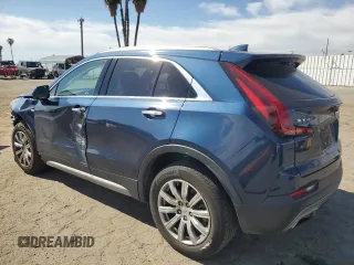 2019 Cadillac XT4 FWD Premium Luxury with VIN 1GYFZCR42KF104457, listed as a Copart auction lot 52783485 with 57,572 mi miles and Salvage title. Bid and sale history available at DreamBid. Image 2.