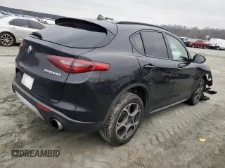 2018 Alfa Romeo Stelvio Sport z VIN ZASFAKPNXJ7B90958, wystawiony jako Copart lot #46043215 z przebiegiem Nie podano mil oraz Szkody całkowita. Historia ofert i sprzedaży dostępna na DreamBid. Obrazek 3.