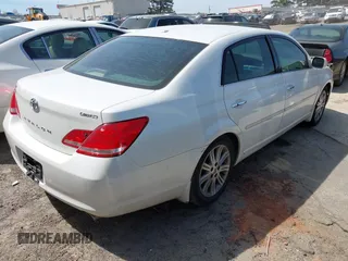 2010 Toyota Avalon XL with VIN 4T1BK3DB6AU363456, listed as a IAAI auction lot 41909395 with 251,402 mi miles and . Bid and sale history available at DreamBid. Image 4.