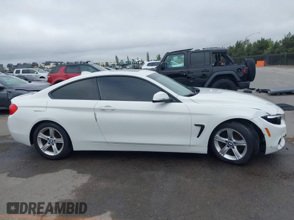 2014 BMW 4 Series 428i with VIN WBA3N3C54EF711449, listed as a IAAI auction lot 42422157 with 72,424 mi miles and . Bid and sale history available at DreamBid. Image 13.