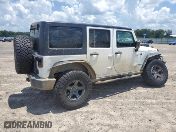 2015 Jeep Wrangler Unlimited Rubicon with VIN 1C4BJWFG6FL710993, listed as a Copart auction lot 62308195 with 103,938 mi miles and Salvage title. Bid and sale history available at DreamBid. Image 3.