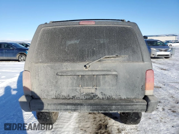 2001 Jeep Cherokee Sport with VIN 1J4FT48S41L615093, listed as a Copart auction lot 88459365 with 257,336 mi miles and Clean Title. Bid and sale history available at carsss.com. Image 6.