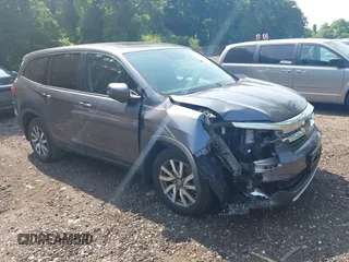 2020 Honda Pilot EX-L z VIN 5FNYF6H59LB029961, wystawiony jako IAAI lot #42552981 z przebiegiem 58 529 mil mil oraz . Historia ofert i sprzedaży dostępna na DreamBid. Obrazek 1.