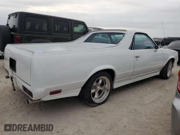 1984 Chevrolet El Camino z VIN 1GCCW80H7ER173291, wystawiony jako Copart lot #76606244 z przebiegiem Nie podano mil oraz Szkoda całkowita • Salvage title. Historia ofert i sprzedaży dostępna na DreamBid. Obrazek 3.