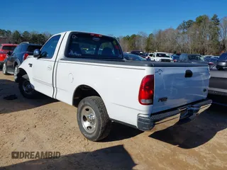 2001 Ford F-150 XL z VIN 1FTRF17L61NB04122, wystawiony jako IAAI lot #38304103 z przebiegiem 186 816 mil mil oraz . Historia ofert i sprzedaży dostępna na DreamBid. Obrazek 3.