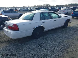 1999 Mercury Grand Marquis GS with VIN 2MEFM74W6XX604927, listed as a IAAI auction lot 41467177 with 187,277 mi miles. Bid and sale history available at carsss.com. Image 4.