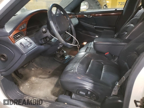2001 Cadillac DeVille z VIN 1G6KD54Y31U294274, wystawiony jako Copart lot #46474844 z przebiegiem 147 396 mil mil oraz Nie do naprawy • Non repairable. Historia ofert i sprzedaży dostępna na DreamBid. Obrazek 7.