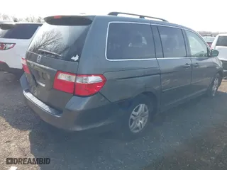 2007 Honda Odyssey EX-L with VIN 5FNRL38717B070328, listed as a IAAI auction lot 41696829 with 171,229 mi miles. Bid and sale history available at carsss.com. Image 4.
