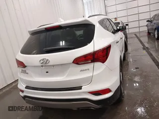 2017 Hyundai Santa Fe 2.4L z VIN 5XYZU3LBXHG444308, wystawiony jako IAAI lot #41685902 z przebiegiem 70 838 mil mil oraz . Historia ofert i sprzedaży dostępna na DreamBid. Obrazek 16.