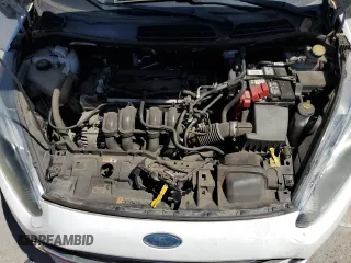 2016 Ford Fiesta S z VIN 3FADP4AJ4GM199899, wystawiony jako Copart lot #57304405 z przebiegiem 84 785 mil mil oraz Czysty tytuł • Clean title. Historia ofert i sprzedaży dostępna na DreamBid. Obrazek 11.