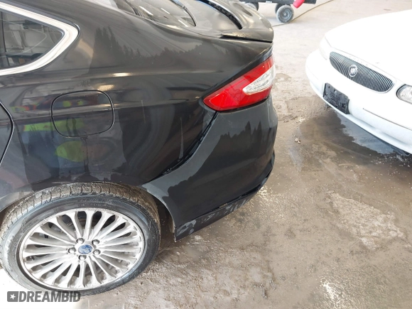 2014 Ford Fusion Titanium Hybrid with VIN 3FA6P0RU1ER290290, listed as a IAAI auction lot 41671735 with 207,405 mi miles. Bid and sale history available at carsss.com. Image 6.