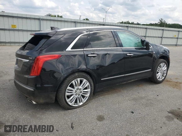 2018 Cadillac XT5 Premium Luxury FWD z VIN 1GYKNERS9JZ234513, wystawiony jako Copart lot #54105735 z przebiegiem 127 345 mil mil oraz Szkoda całkowita • Salvage title. Historia ofert i sprzedaży dostępna na DreamBid. Obrazek 3.