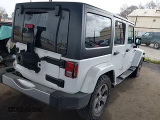 2017 Jeep Wrangler Unlimited Sahara with VIN 1C4HJWEG0HL595144, listed as a IAAI auction lot 41644511 with 143,512 mi miles. Bid and sale history available at carsss.com. Image 4.