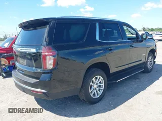 2023 Chevrolet Tahoe LS z VIN 1GNSCMKD9PR282840, wystawiony jako IAAI lot #41904280 z przebiegiem 73 298 mil mil oraz . Historia ofert i sprzedaży dostępna na DreamBid. Obrazek 4.