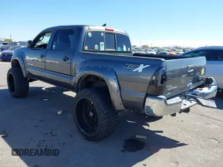 2014 Toyota Tacoma PreRunner with VIN 3TMJU4GN3EM165840, listed as a IAAI auction lot 41666871 with 150,333 mi miles and . Bid and sale history available at DreamBid. Image 3.
